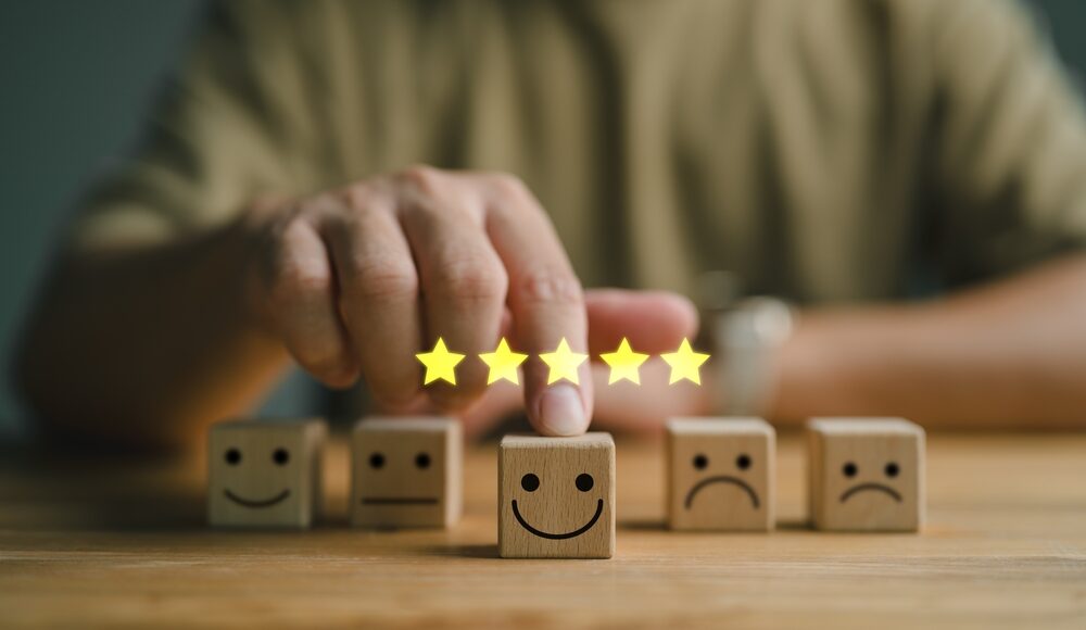 wooden cubes representing customer satisfaction